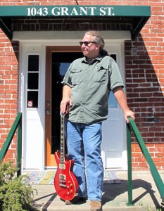 J Shelby stands in front of the 851 Music Studio