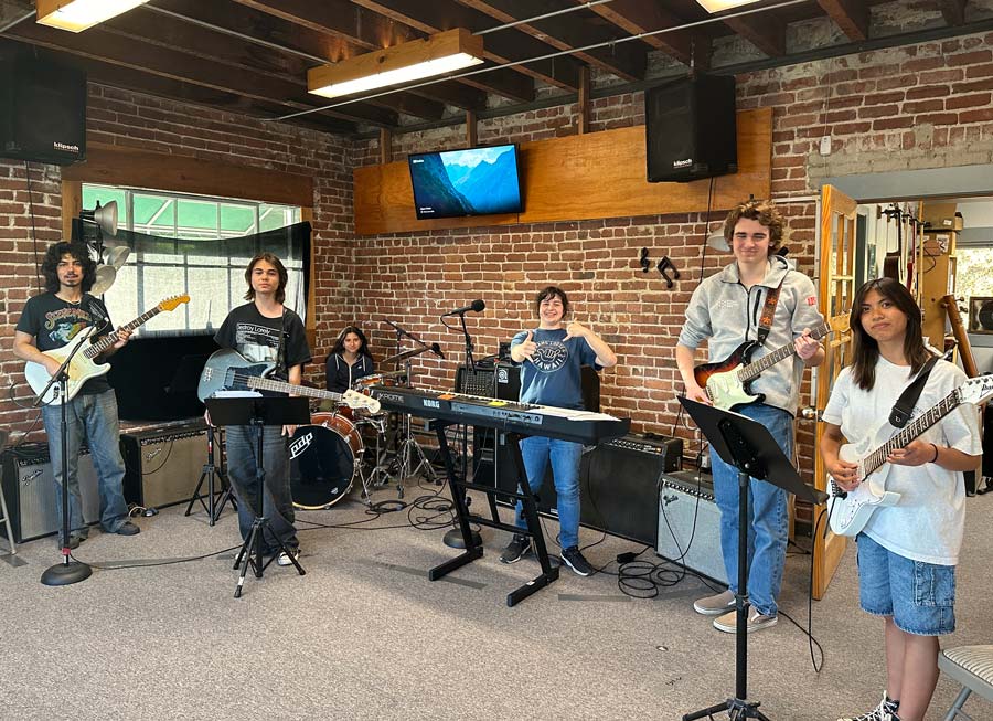 Students playing together at a jam session