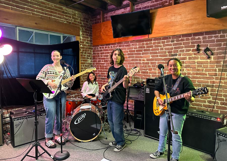 Students participating in a workshop at 851 Music Studio